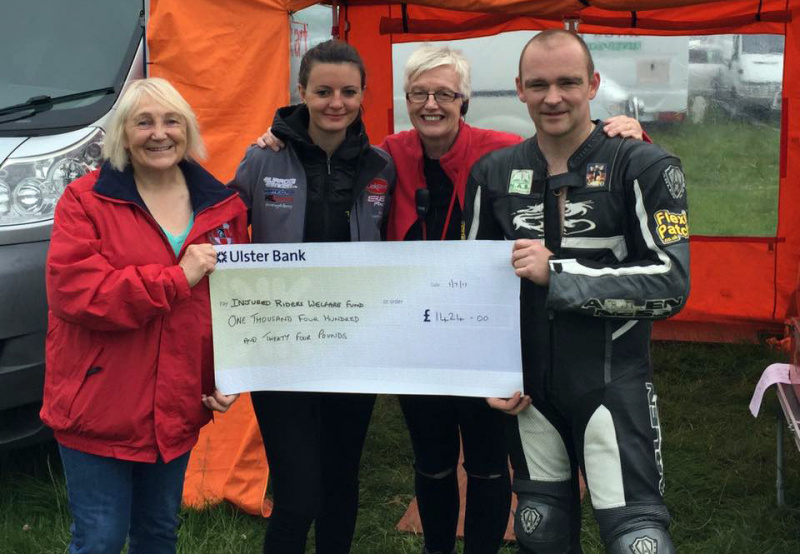 Delivering  the proceeds from the sale of stickers in memory of Dario Cecconi